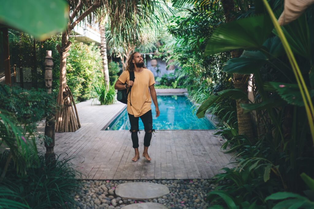 Man admiring view of tropical resort